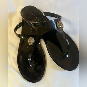 Kurt Geiger Maddison T-Bar black glossy jelly sandals with gold detail